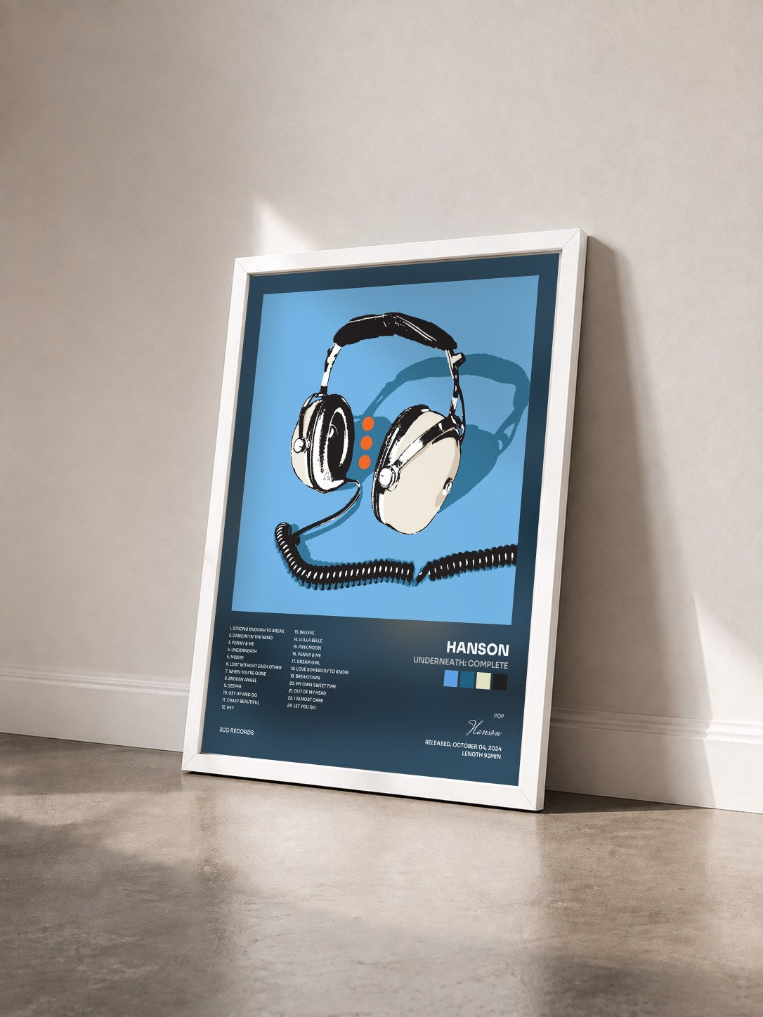 #blanc Tableau de l'album Underneath: Complete de Hanson vu de trois quarts, cadre blanc