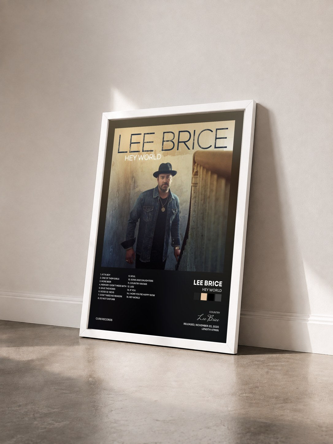 #blanc Tableau de l'album Hey World de Lee Brice vu de trois quarts, cadre blanc