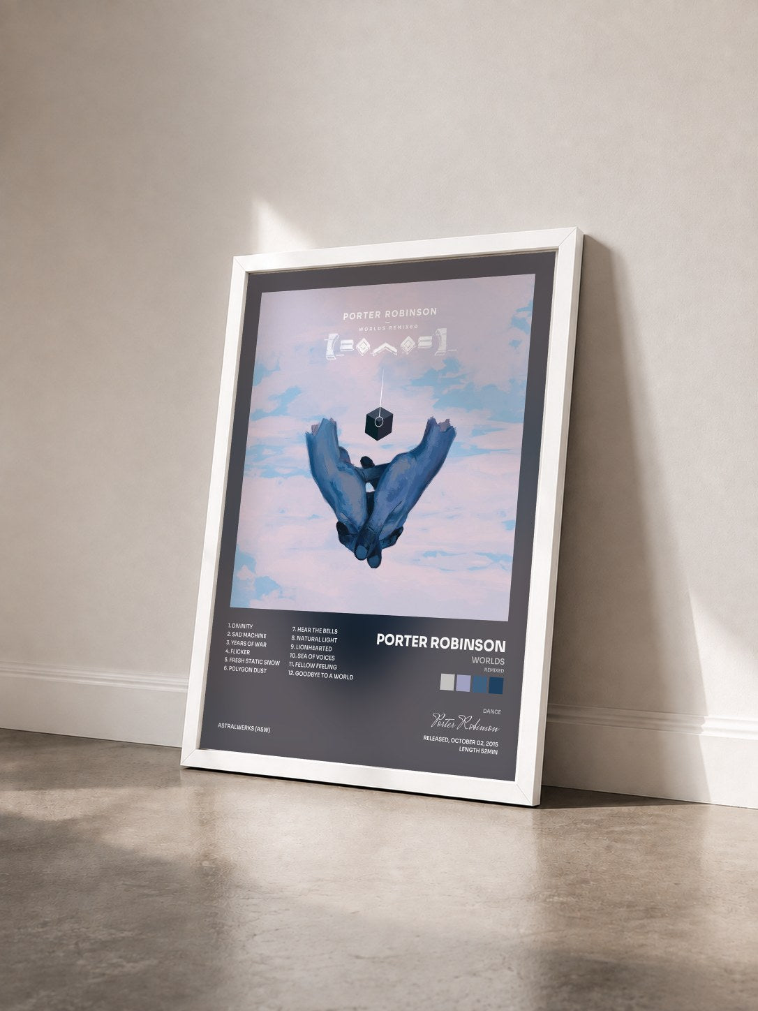 #blanc Tableau de l'album Worlds (Remixed) de Porter Robinson vu de trois quarts, cadre blanc