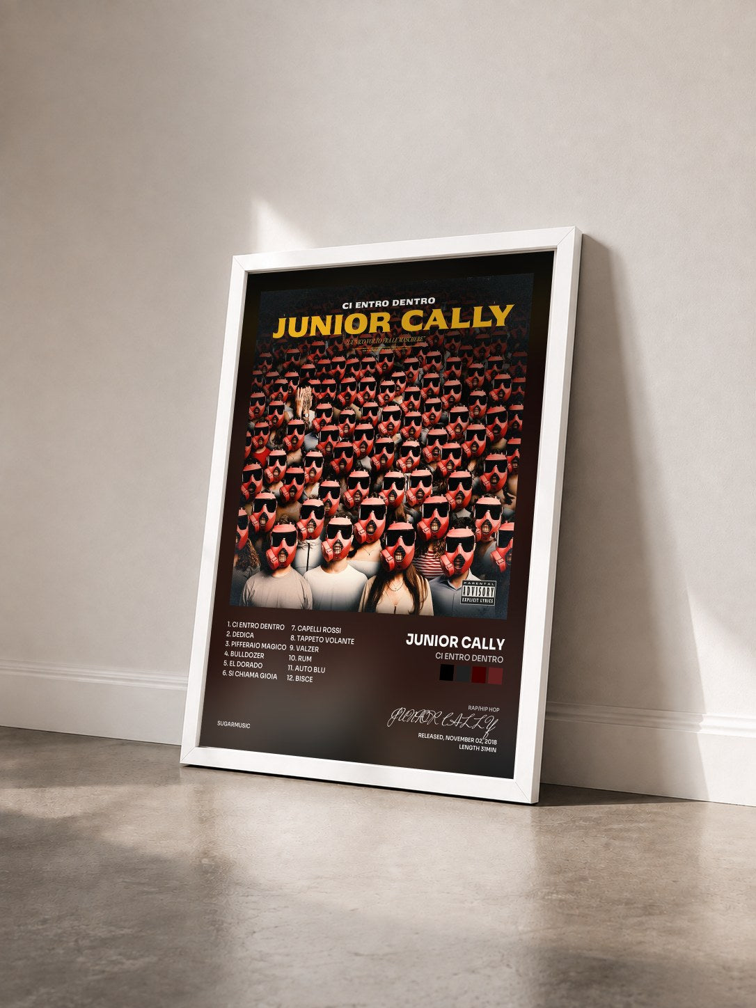 #blanc Tableau de l'album Ci entro dentro de JUNIOR CALLY vu de trois quarts, cadre blanc