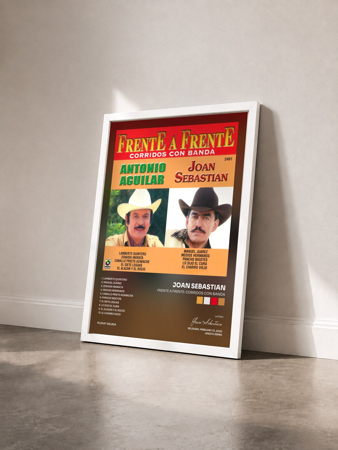 #blanc Tableau de l'album Frente A Frente: Corridos Con Banda de Joan Sebastian vu de trois quarts, cadre blanc