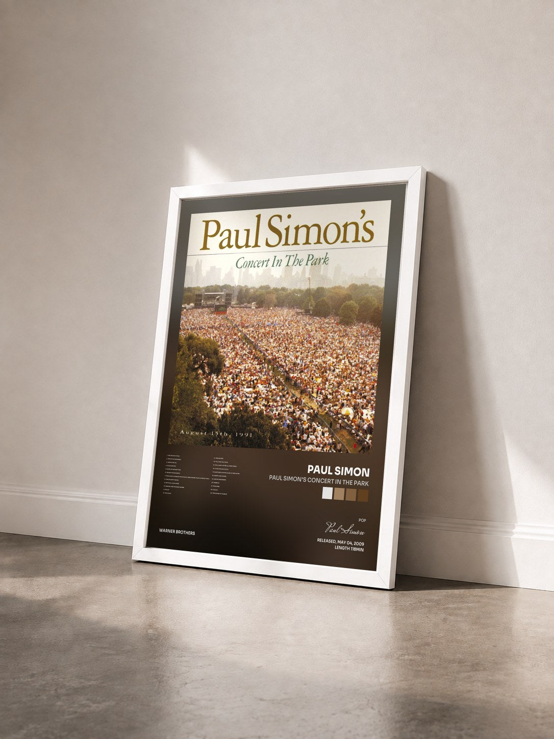 #blanc Tableau de l'album Paul Simon's Concert In The Park de Paul Simon vu de trois quarts, cadre blanc