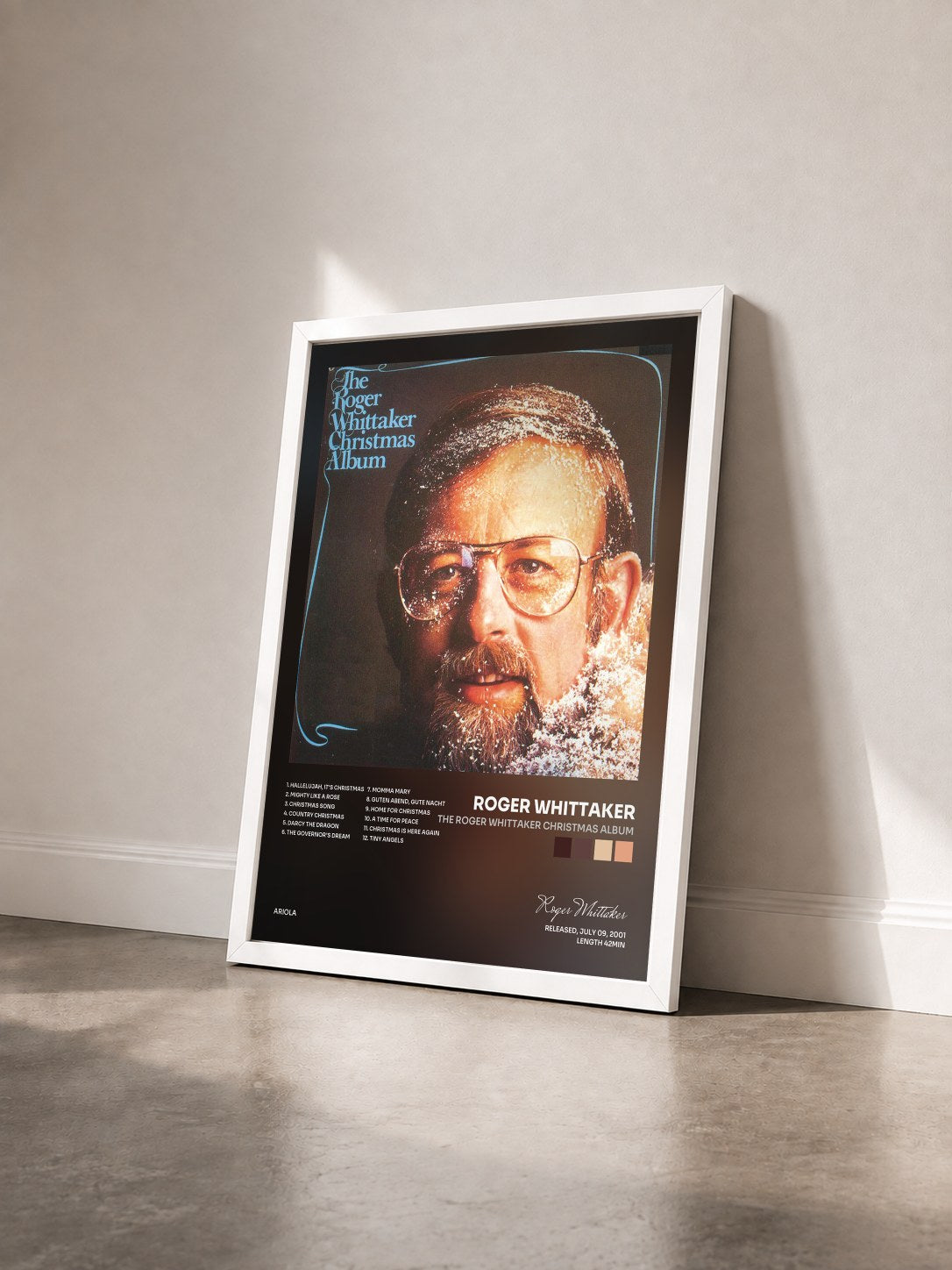 #blanc Tableau de l'album The Roger Whittaker Christmas Album de Roger Whittaker vu de trois quarts, cadre blanc