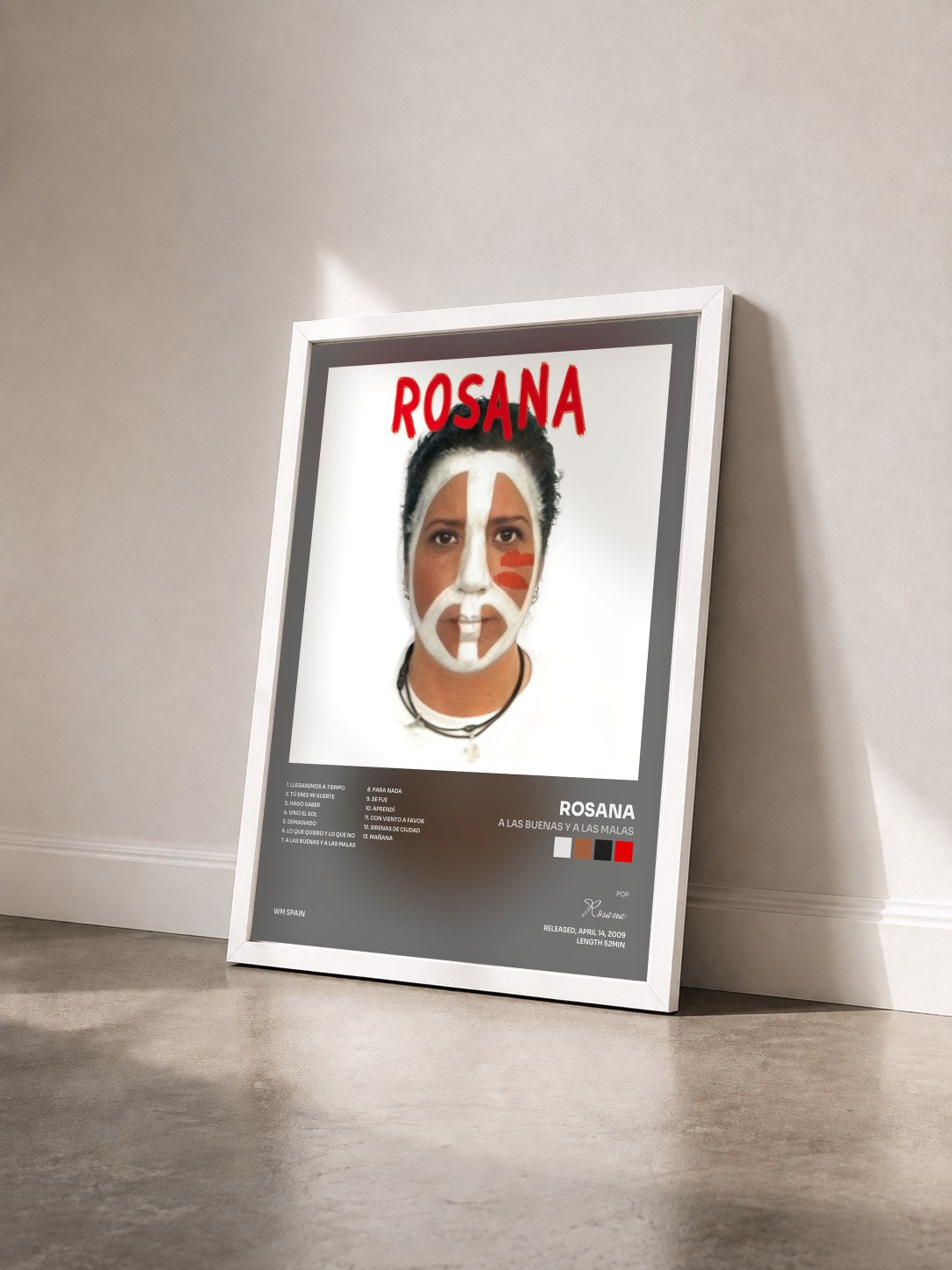 #blanc Tableau de l'album A las buenas y a las malas de Rosana vu de trois quarts, cadre blanc