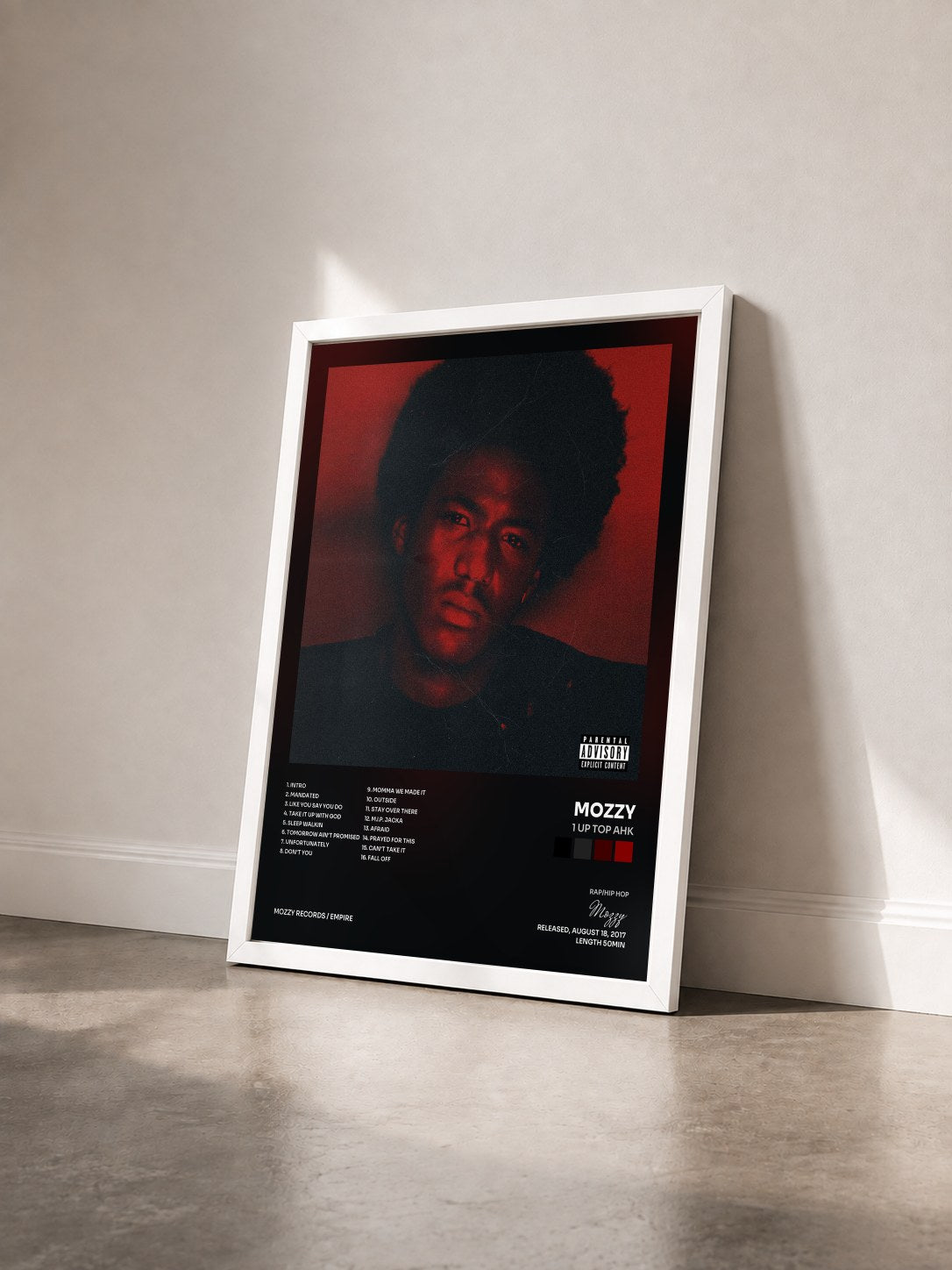 #blanc Tableau de l'album 1 Up Top Ahk de Mozzy vu de trois quarts, cadre blanc