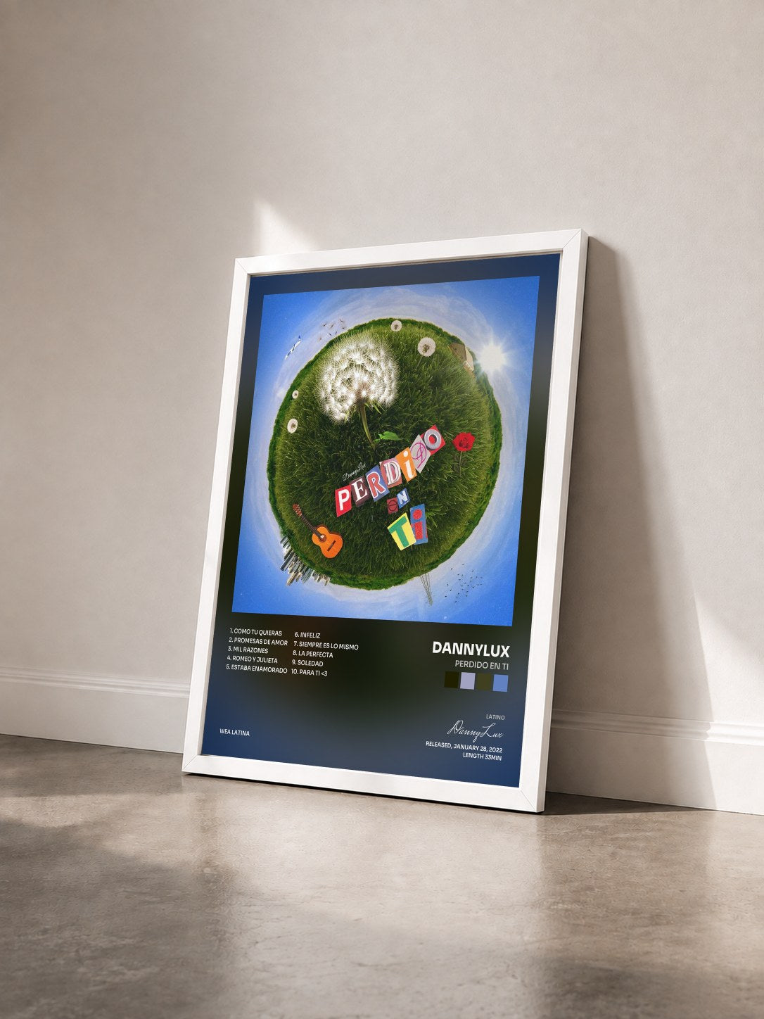 #blanc Tableau de l'album Perdido En Ti de DannyLux vu de trois quarts, cadre blanc