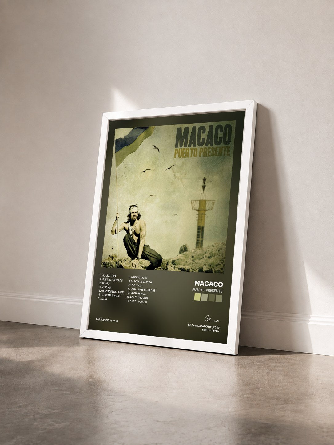 #blanc Tableau de l'album Puerto Presente de Macaco vu de trois quarts, cadre blanc