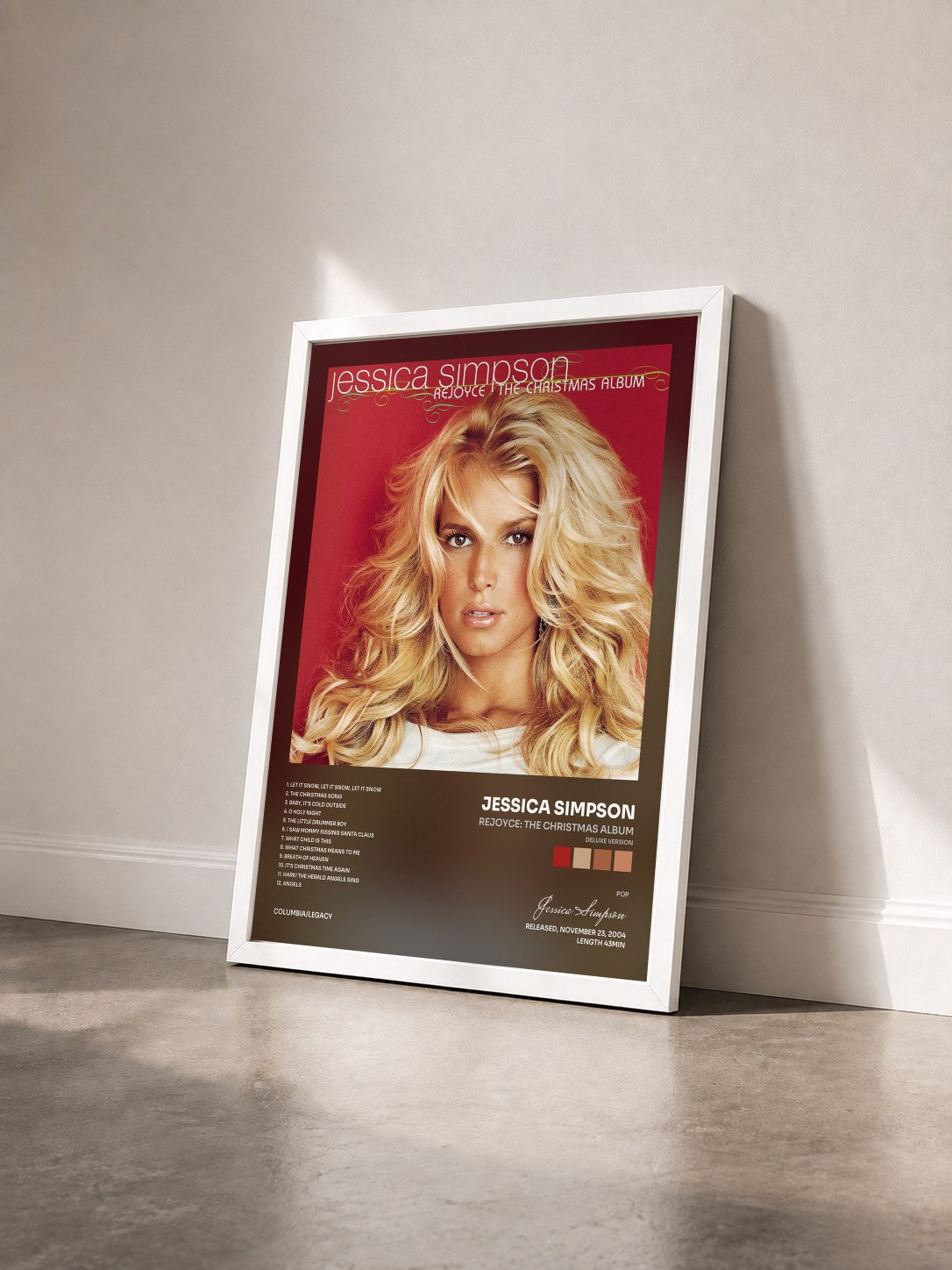 #blanc Tableau de l'album ReJoyce: The Christmas Album (Deluxe Version) de Jessica Simpson vu de trois quarts, cadre blanc