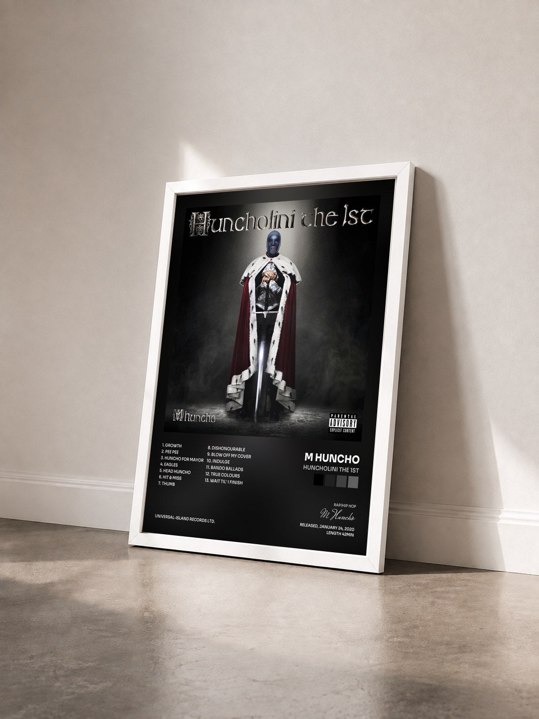#blanc Tableau de l'album Huncholini The 1st de M Huncho vu de trois quarts, cadre blanc