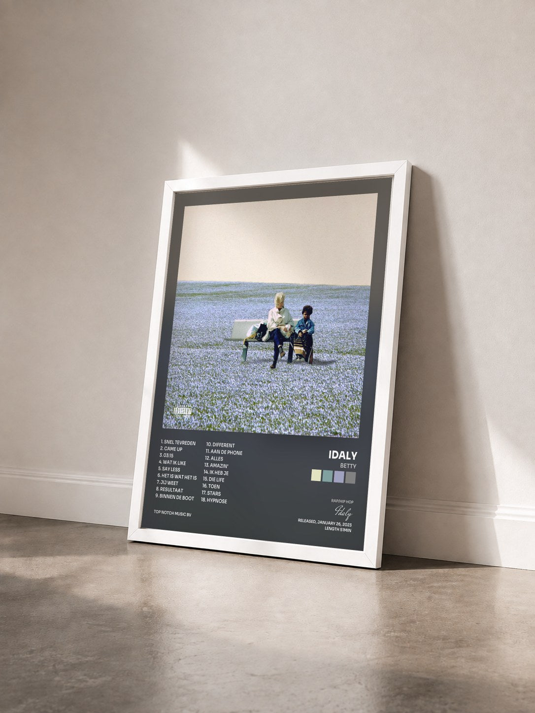 #blanc Tableau de l'album Betty de Idaly vu de trois quarts, cadre blanc
