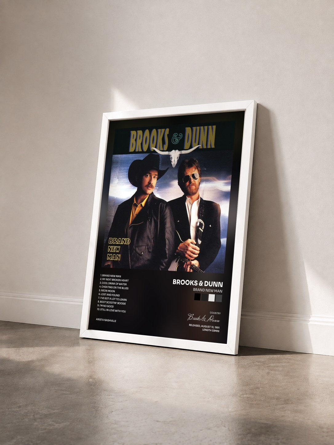 #blanc Tableau de l'album Brand New Man de Brooks & Dunn vu de trois quarts, cadre blanc