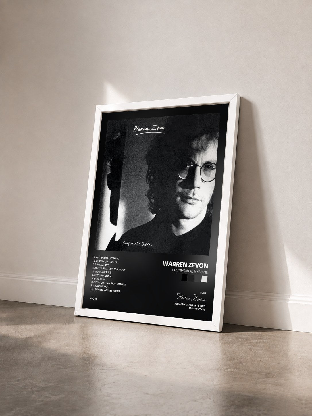 #blanc Tableau de l'album Sentimental Hygiene de Warren Zevon vu de trois quarts, cadre blanc