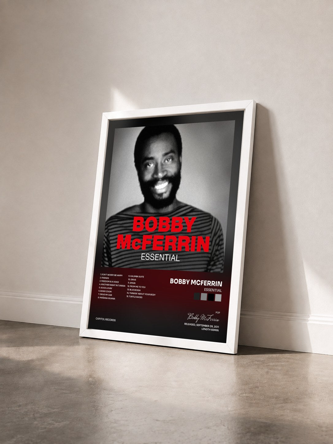 #blanc Tableau de l'album Essential de Bobby McFerrin vu de trois quarts, cadre blanc