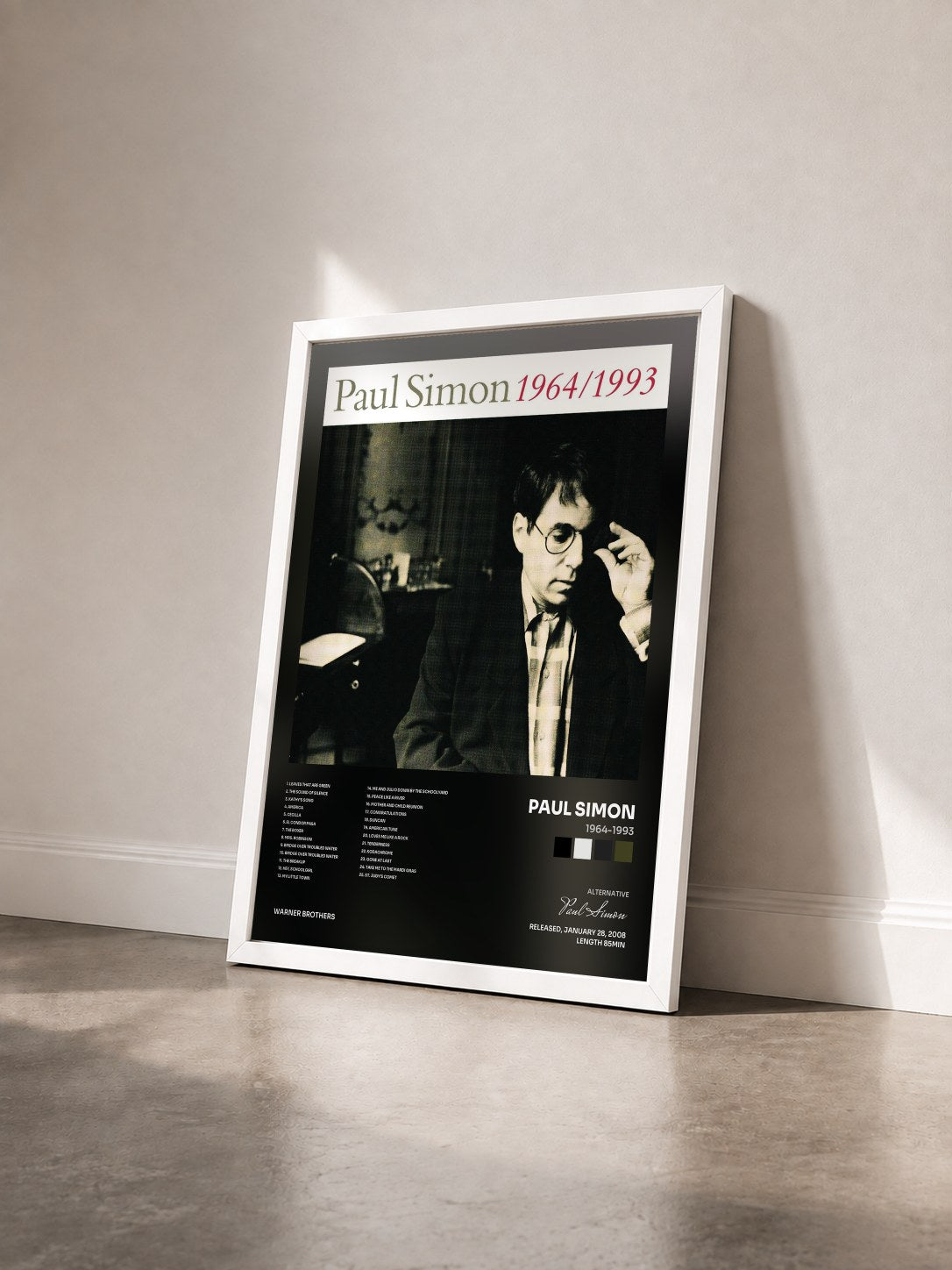 #blanc Tableau de l'album 1964-1993 de Paul Simon vu de trois quarts, cadre blanc