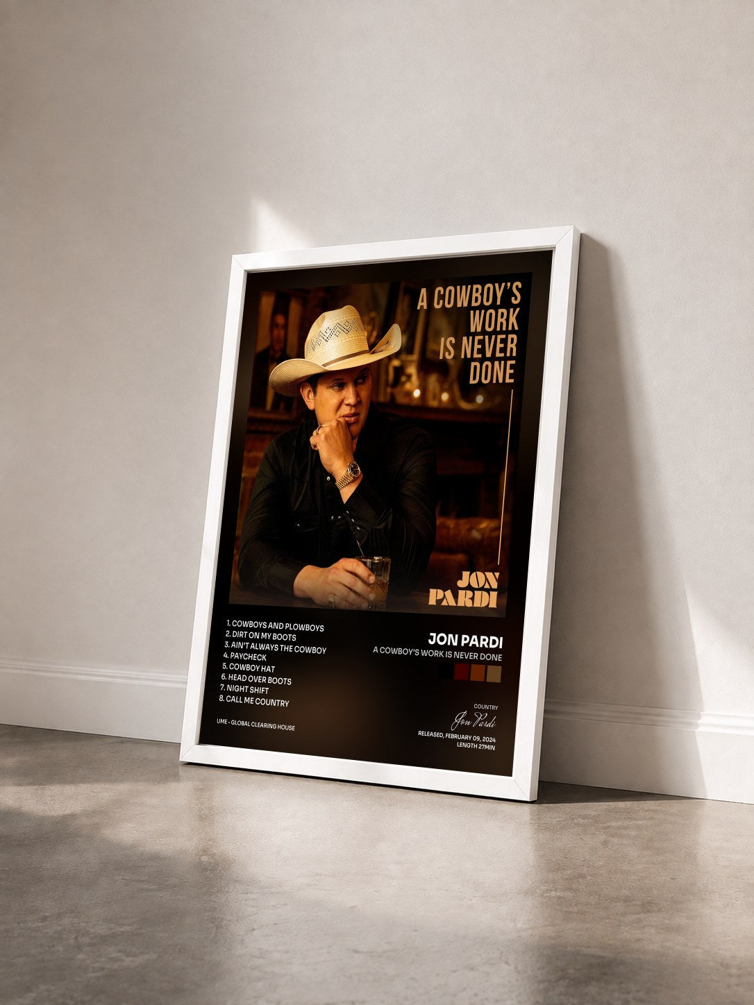 #blanc Tableau de l'album A Cowboy's Work Is Never Done de Jon Pardi vu de trois quarts, cadre blanc