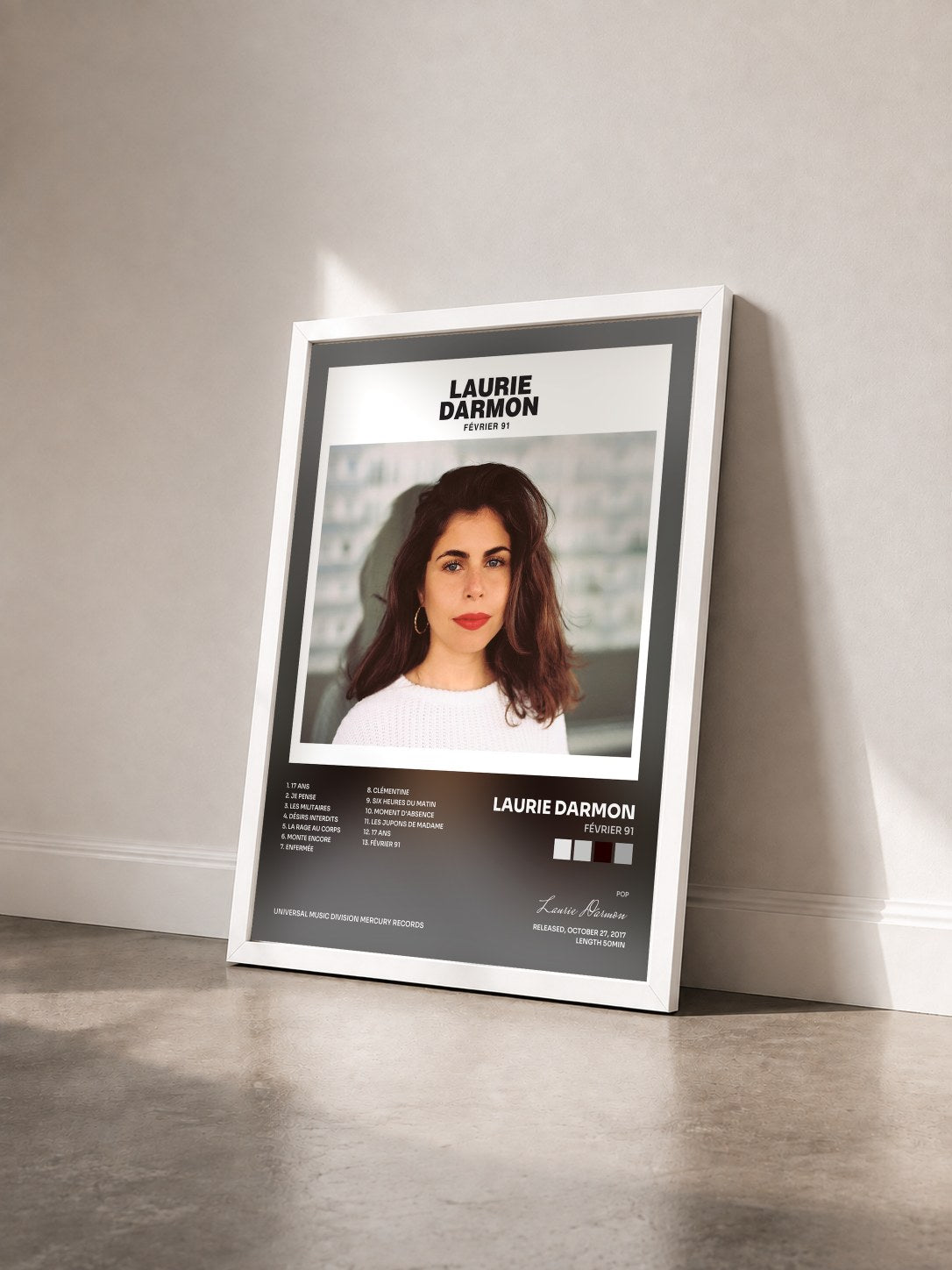 #blanc Tableau de l'album Février 91 de Laurie Darmon vu de trois quarts, cadre blanc