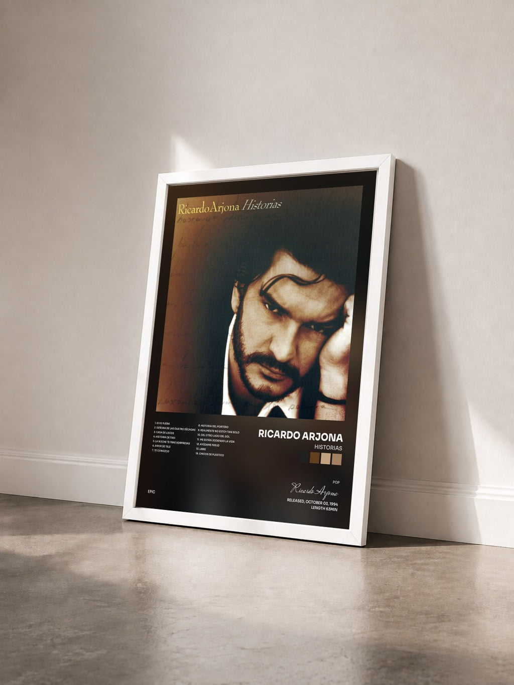 #blanc Tableau de l'album Historias de Ricardo Arjona vu de trois quarts, cadre blanc