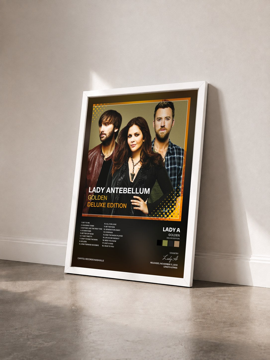 #blanc Tableau de l'album Golden (Deluxe Edition) de Lady A vu de trois quarts, cadre blanc