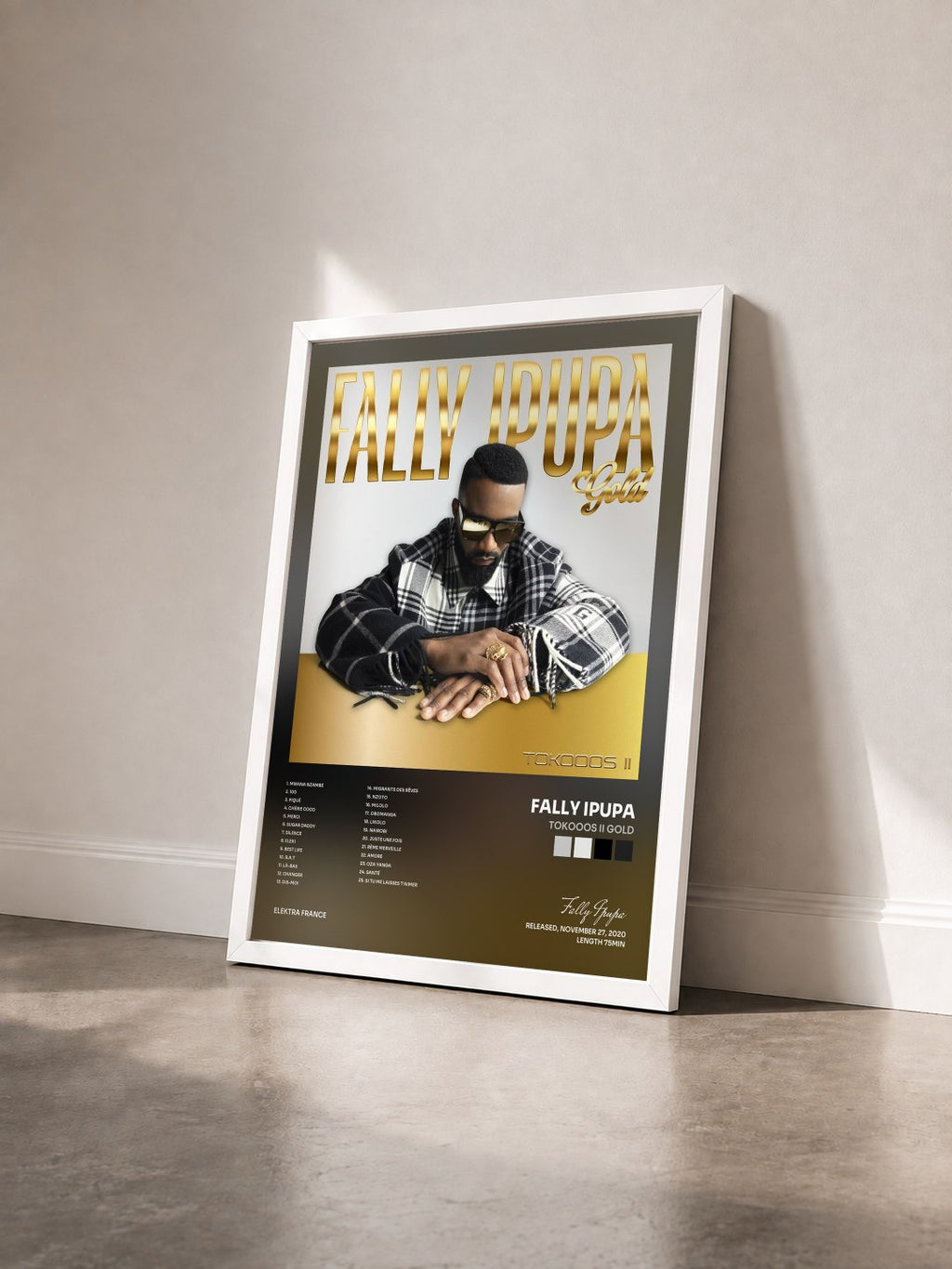 #blanc Tokooos II Gold by Fally Ipupa as a framed art print seen at an angle, white frame