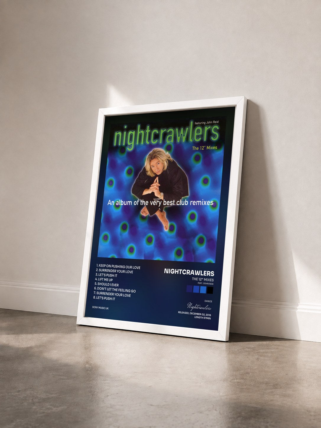 #blanc Tableau de l'album The 12" Mixes (feat. John Reid) de Nightcrawlers vu de trois quarts, cadre blanc