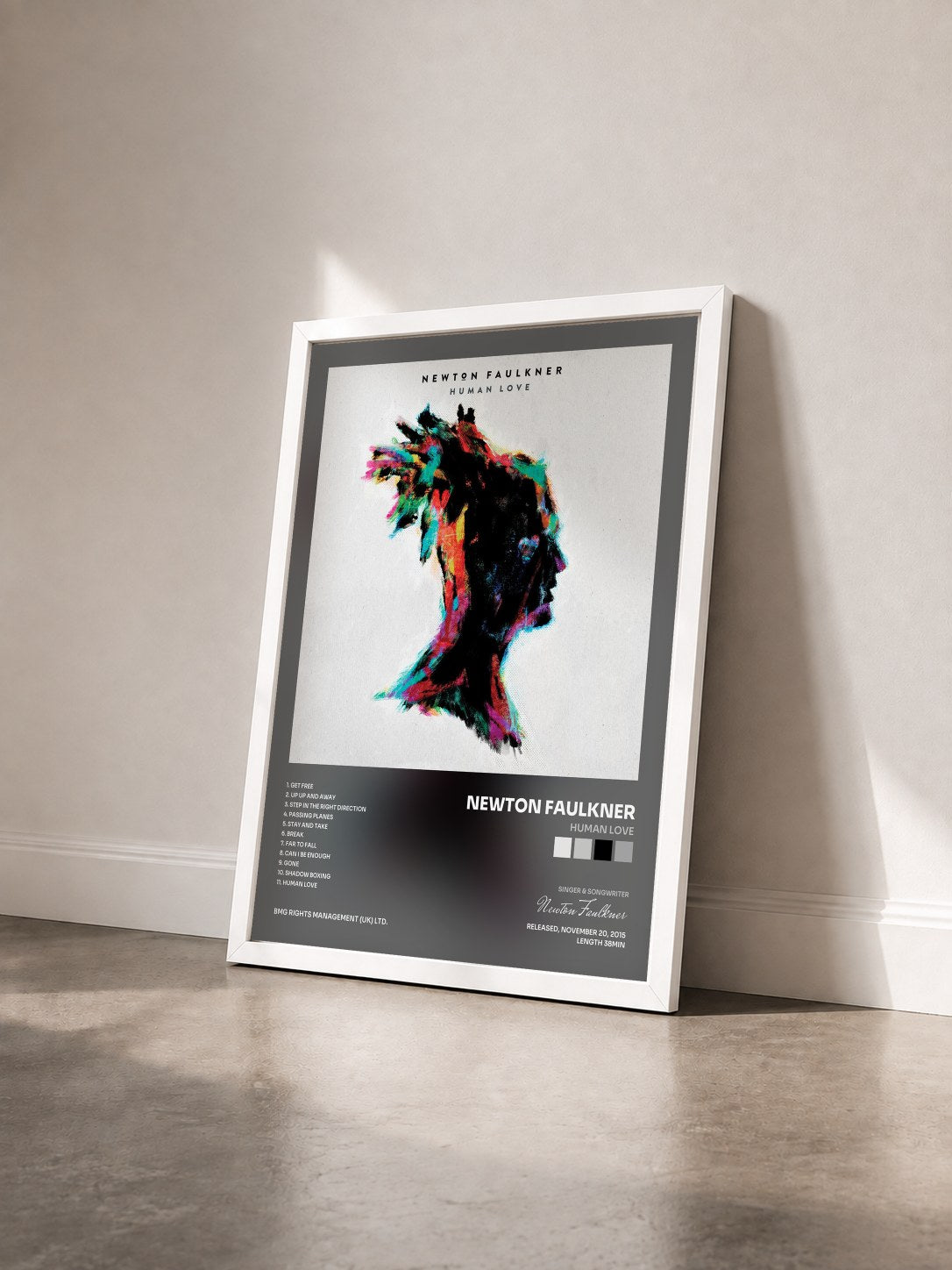 #blanc Tableau de l'album Human Love de Newton Faulkner vu de trois quarts, cadre blanc