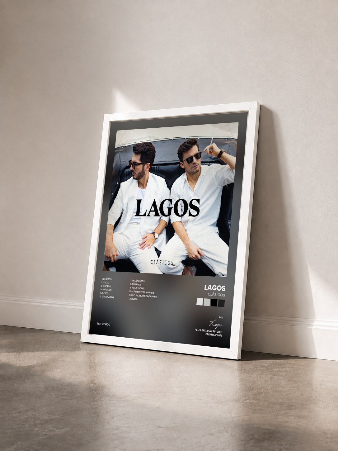 #blanc Tableau de l'album Clásicos de Lagos vu de trois quarts, cadre blanc