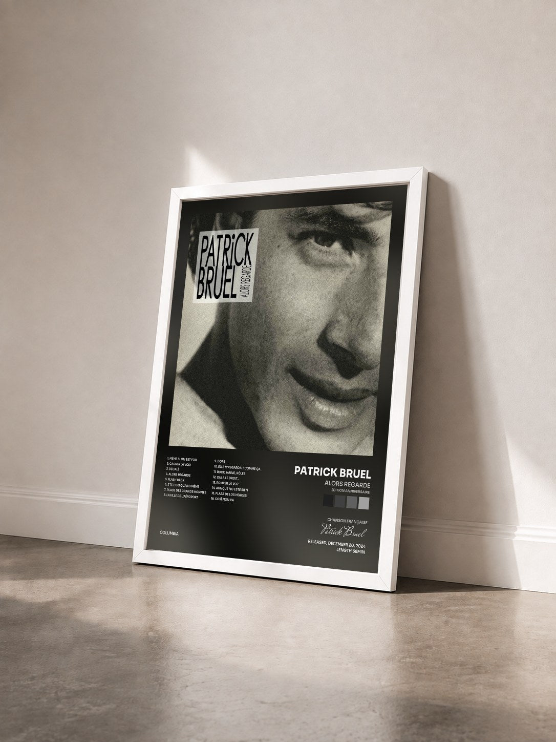 #blanc Tableau de l'album Alors Regarde (Edition anniversaire) de Patrick Bruel vu de trois quarts, cadre blanc