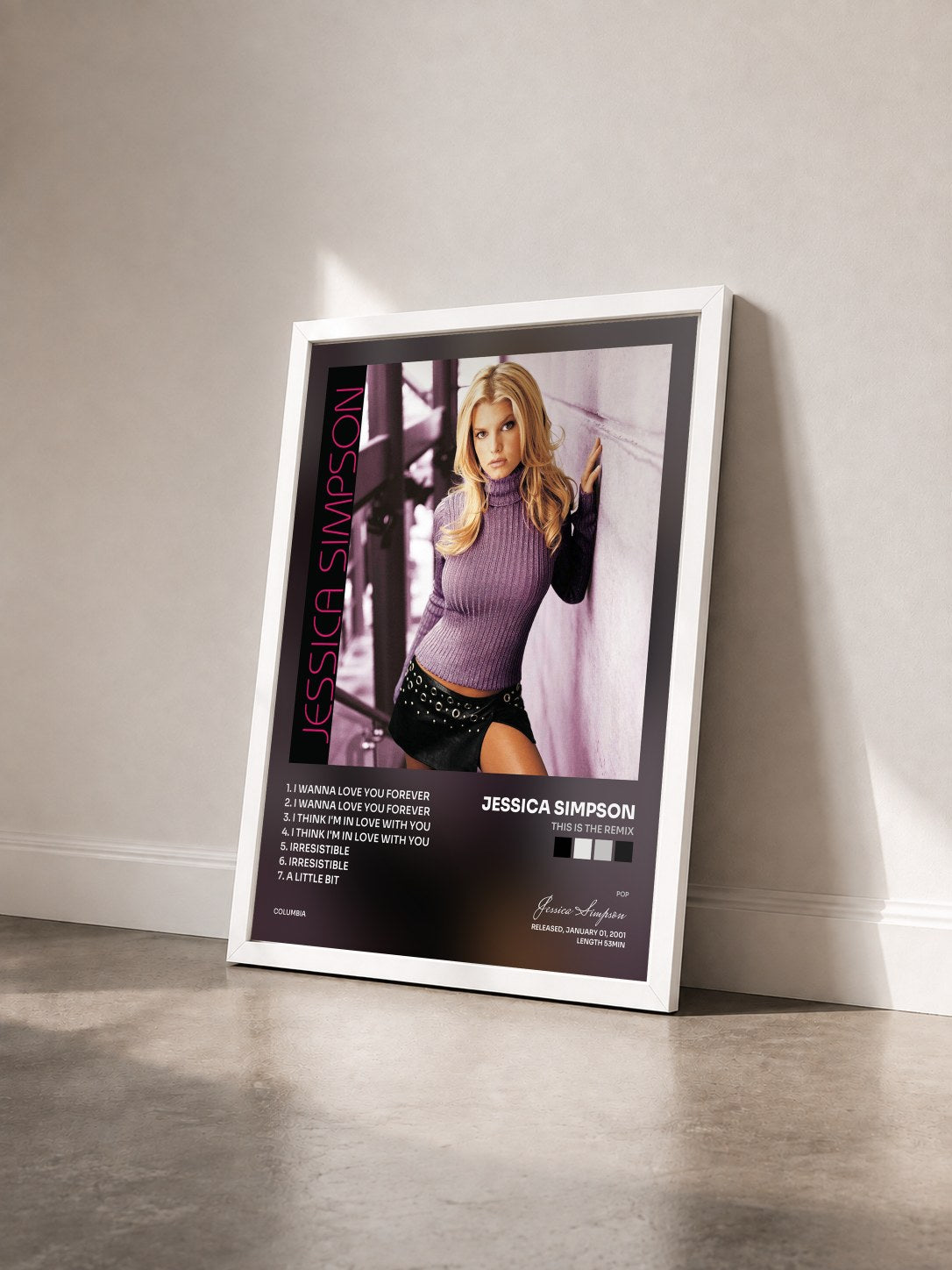 #blanc Tableau de l'album This Is The Remix de Jessica Simpson vu de trois quarts, cadre blanc