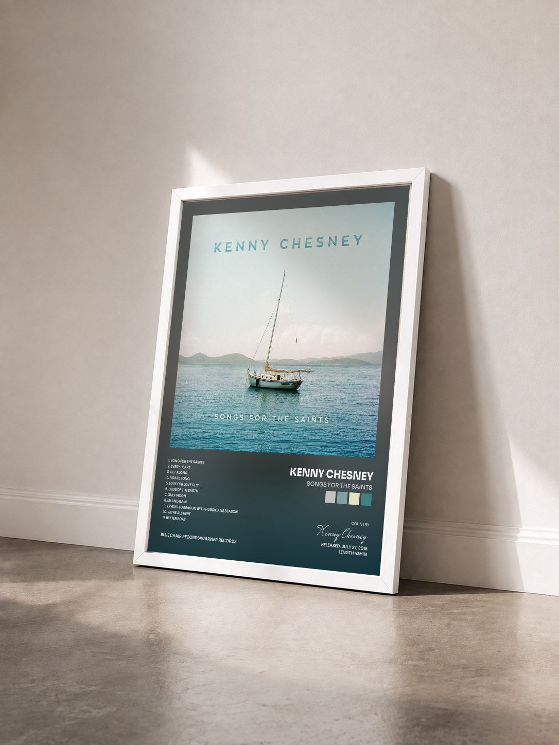 #blanc Tableau de l'album Songs for the Saints de Kenny Chesney vu de trois quarts, cadre blanc