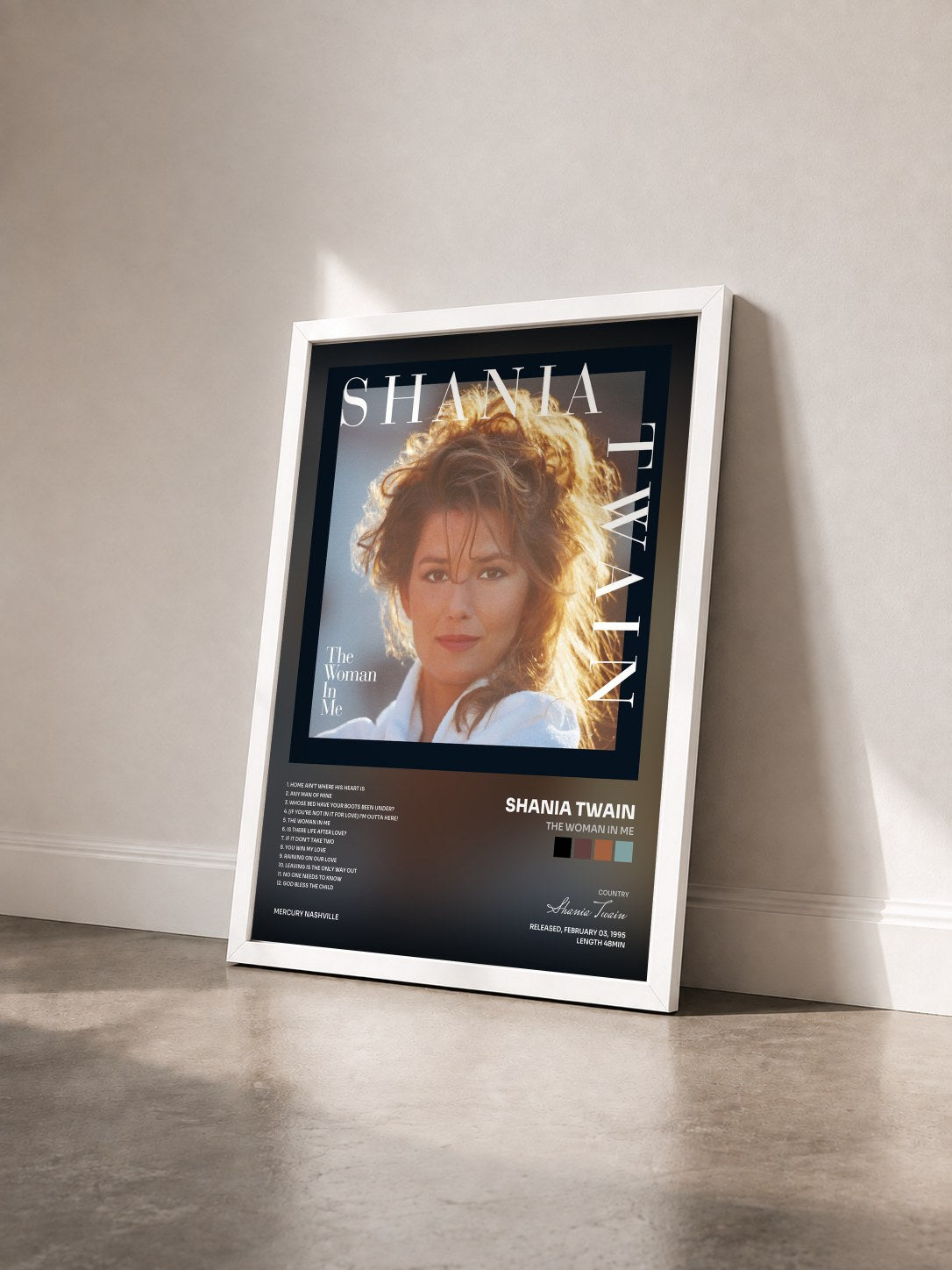 #blanc Tableau de l'album The Woman In Me de Shania Twain vu de trois quarts, cadre blanc