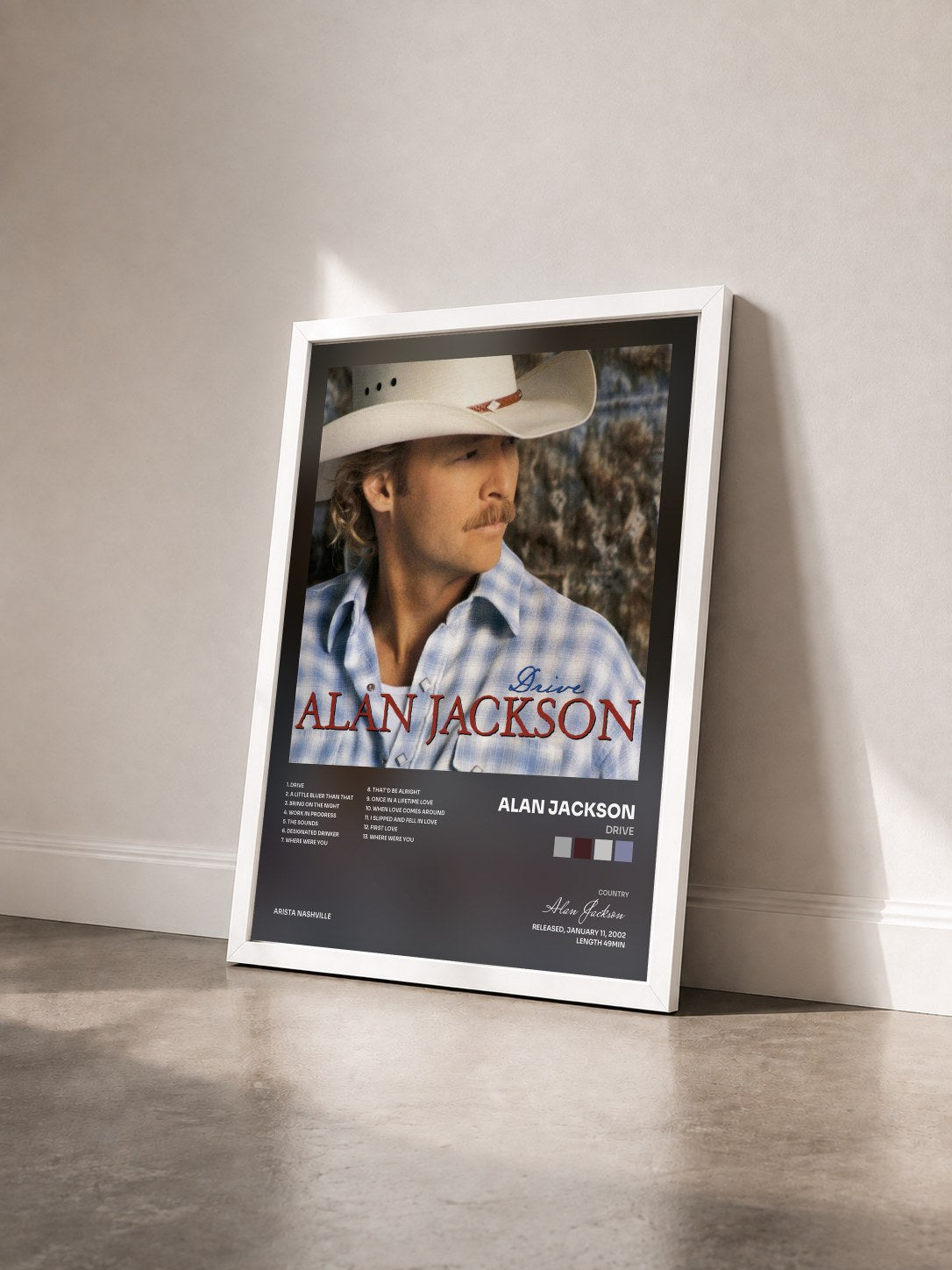 #blanc Tableau de l'album Drive de Alan Jackson vu de trois quarts, cadre blanc