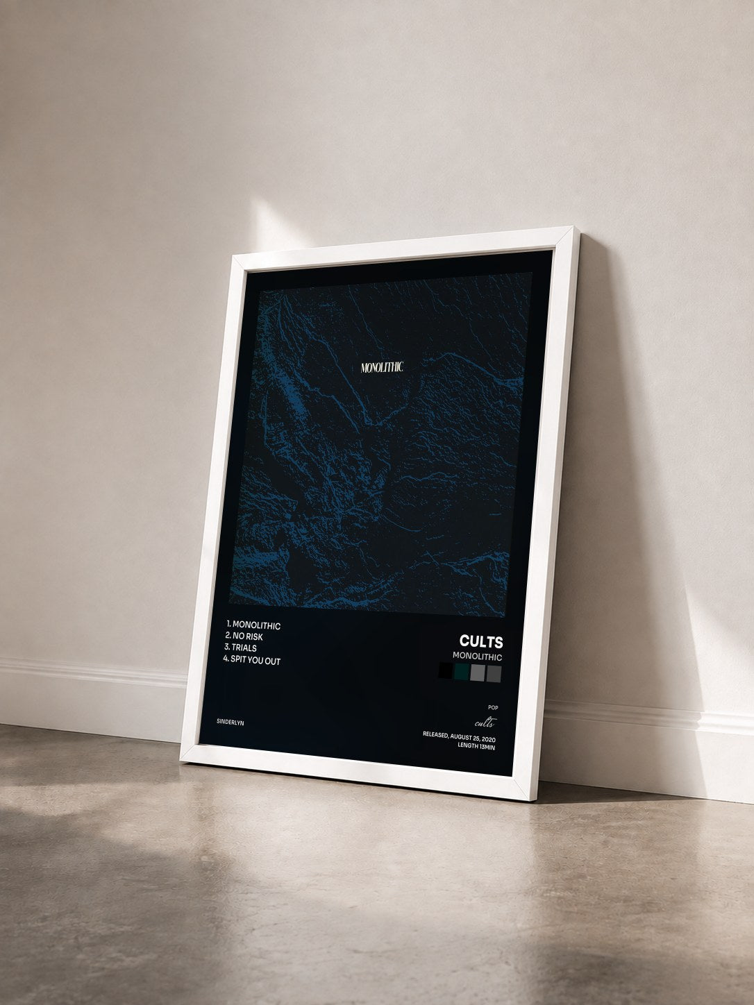 #blanc Tableau de l'album Monolithic de cults vu de trois quarts, cadre blanc