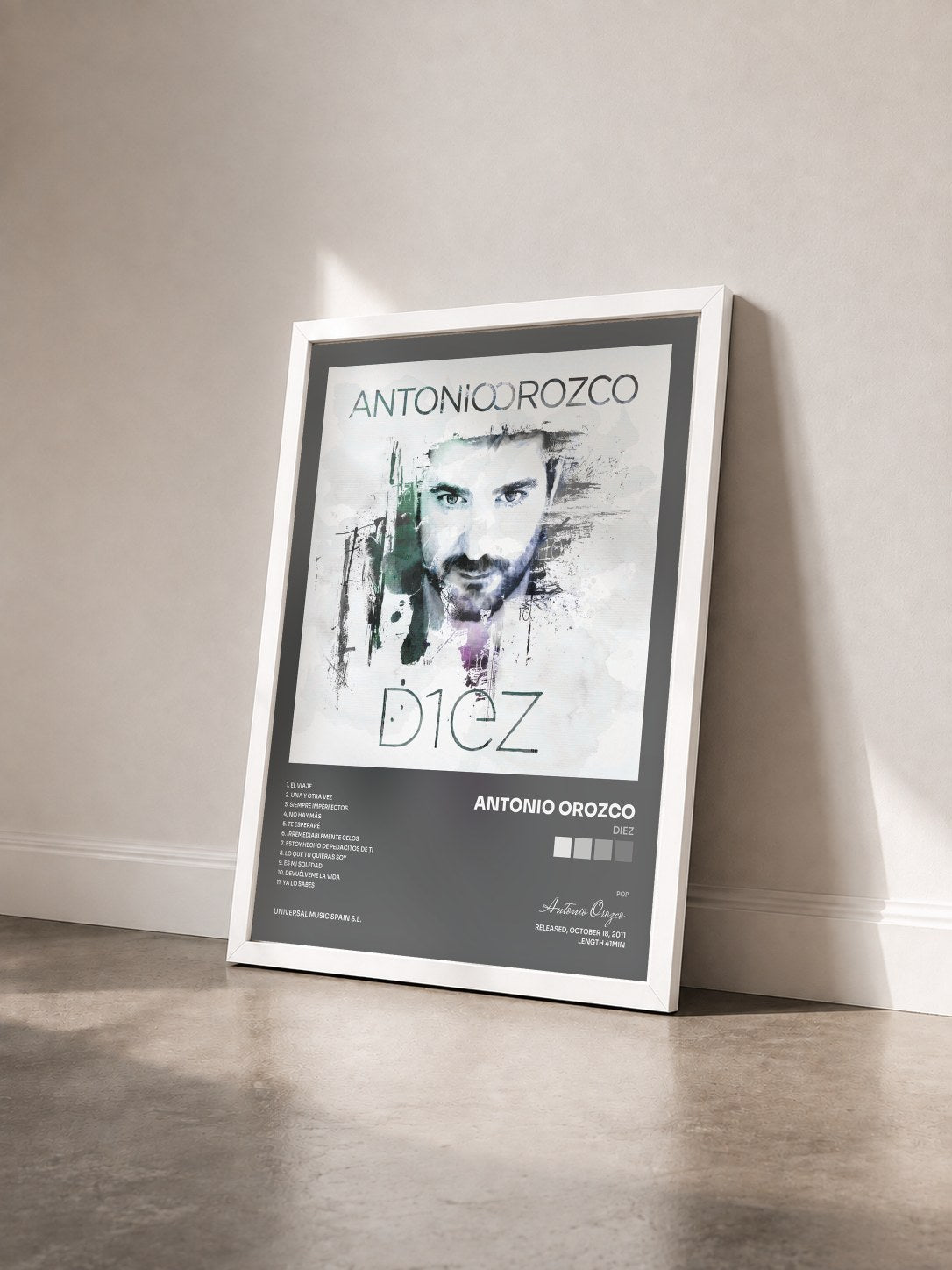 #blanc Tableau de l'album Diez de Antonio Orozco vu de trois quarts, cadre blanc