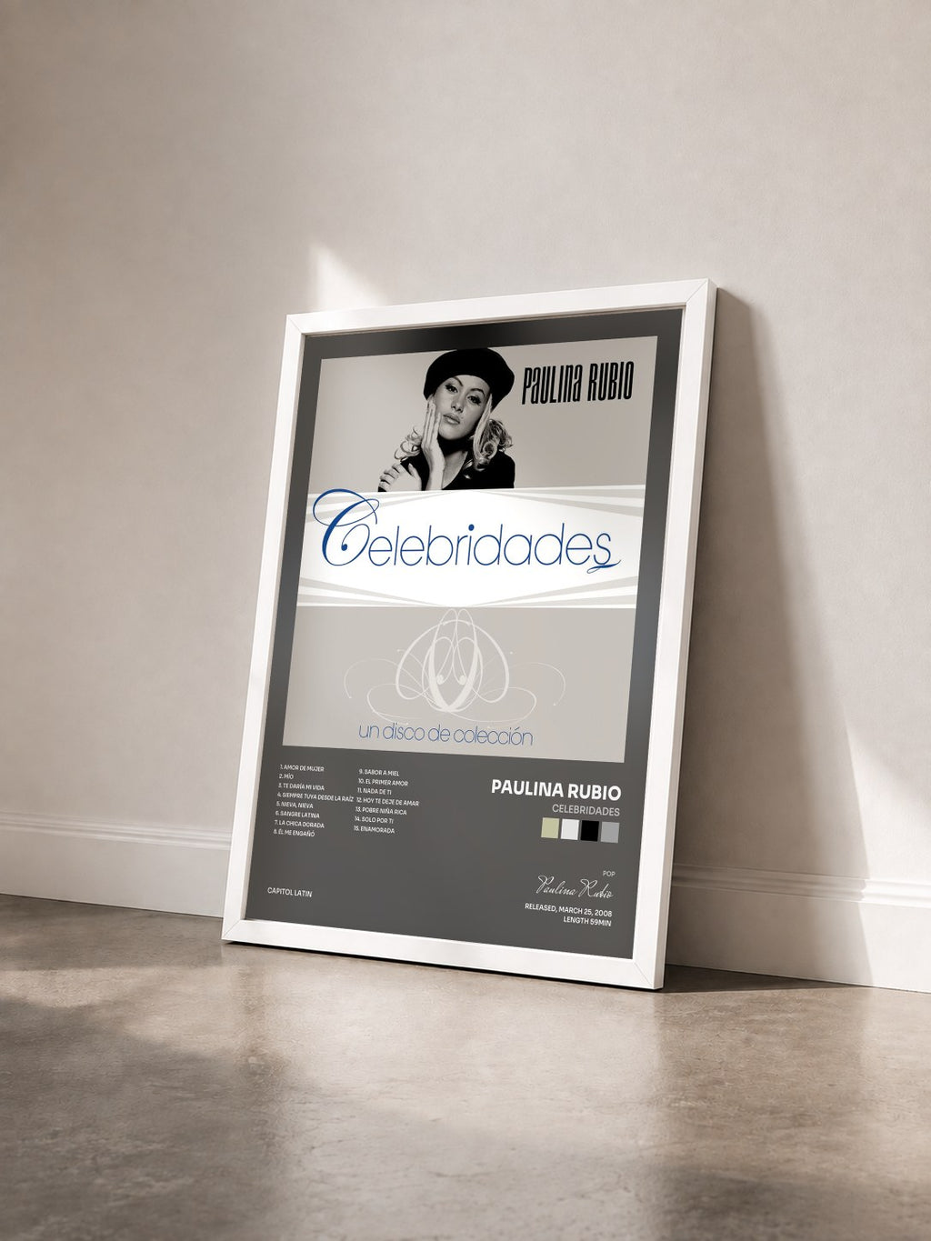 #blanc Tableau de l'album Celebridades de Paulina Rubio vu de trois quarts, cadre blanc