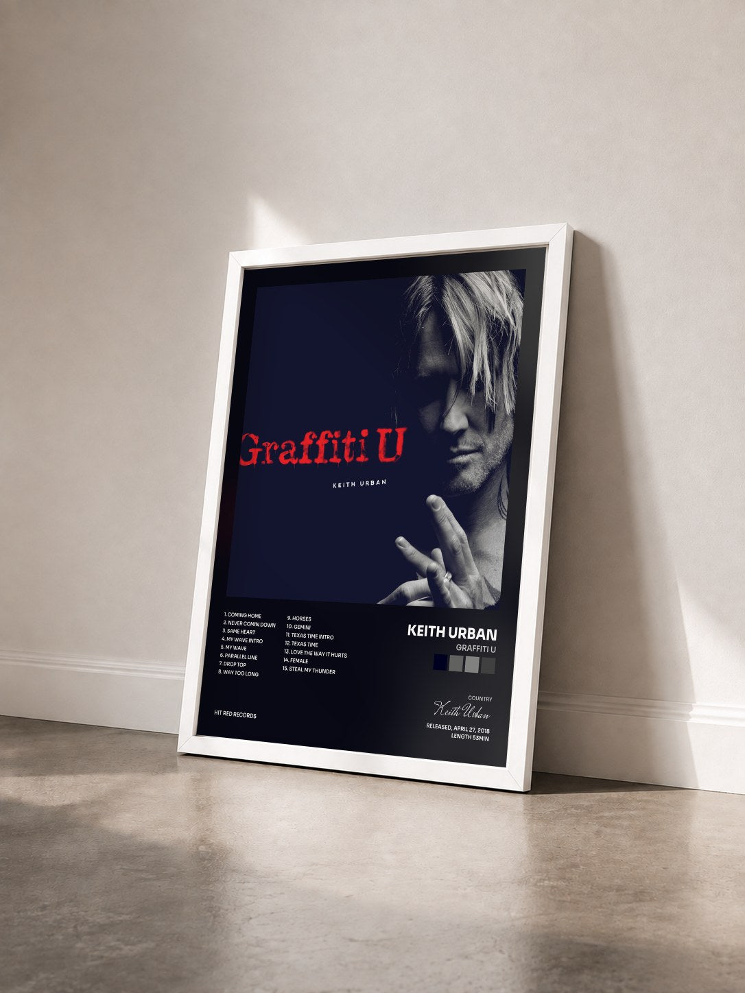 #blanc Tableau de l'album Graffiti U de Keith Urban vu de trois quarts, cadre blanc