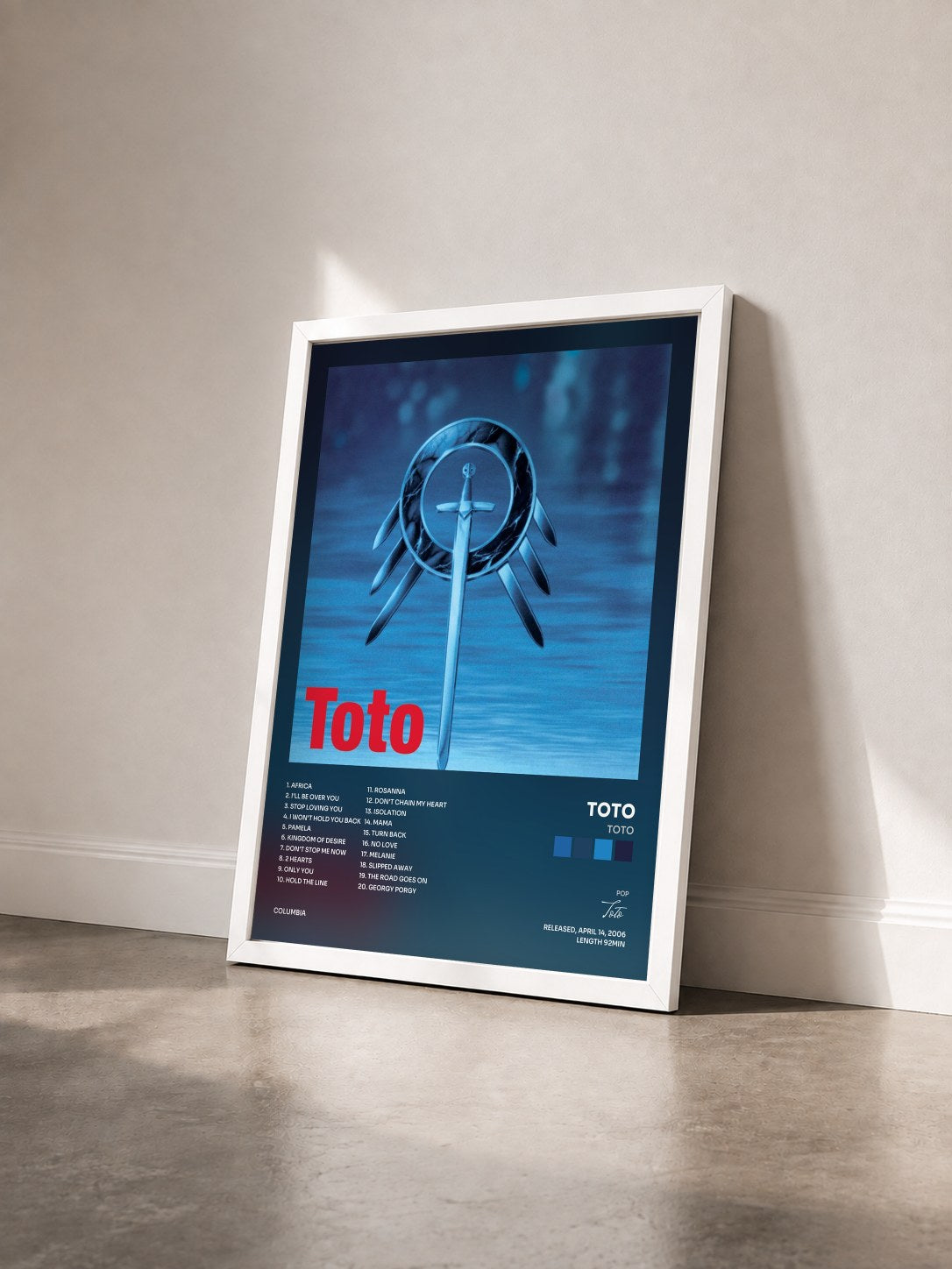 #blanc Tableau de l'album Toto de Toto vu de trois quarts, cadre blanc