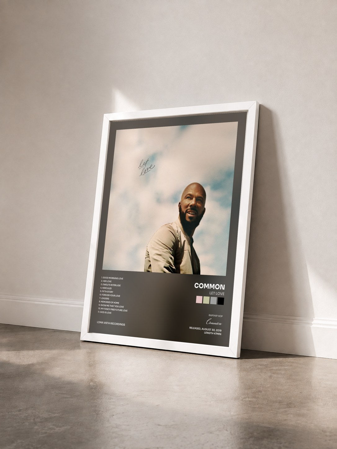#blanc Tableau de l'album Let Love de Common vu de trois quarts, cadre blanc