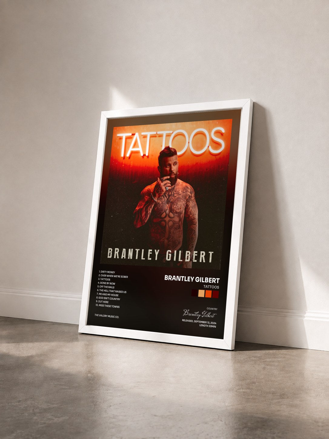 #blanc Tableau de l'album Tattoos de Brantley Gilbert vu de trois quarts, cadre blanc