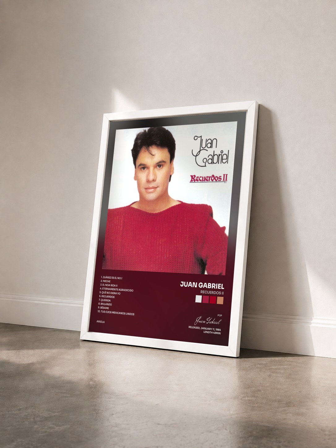 #blanc Tableau de l'album Recuerdos II de Juan Gabriel vu de trois quarts, cadre blanc