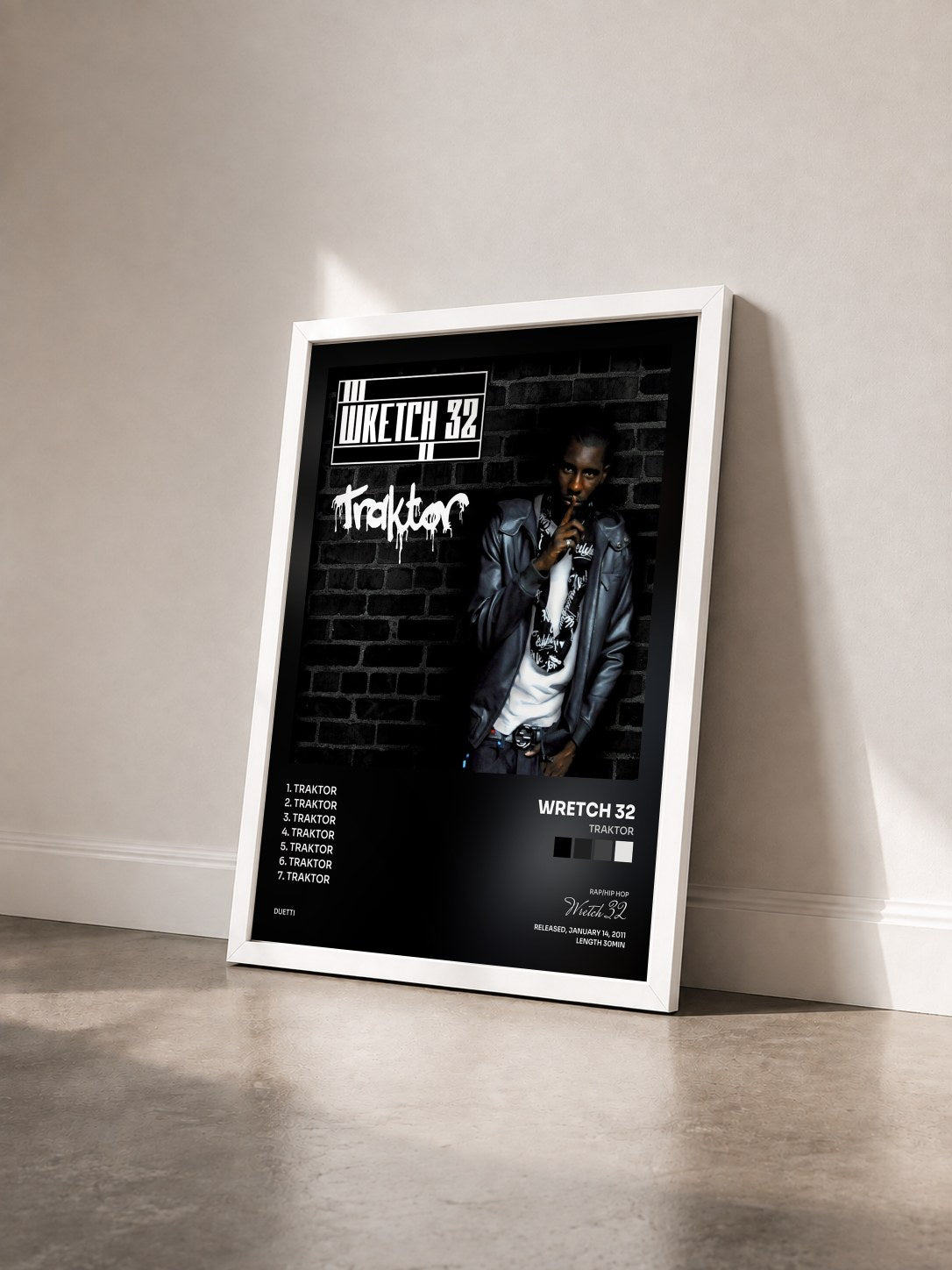 #blanc Tableau de l'album Traktor de Wretch 32 vu de trois quarts, cadre blanc