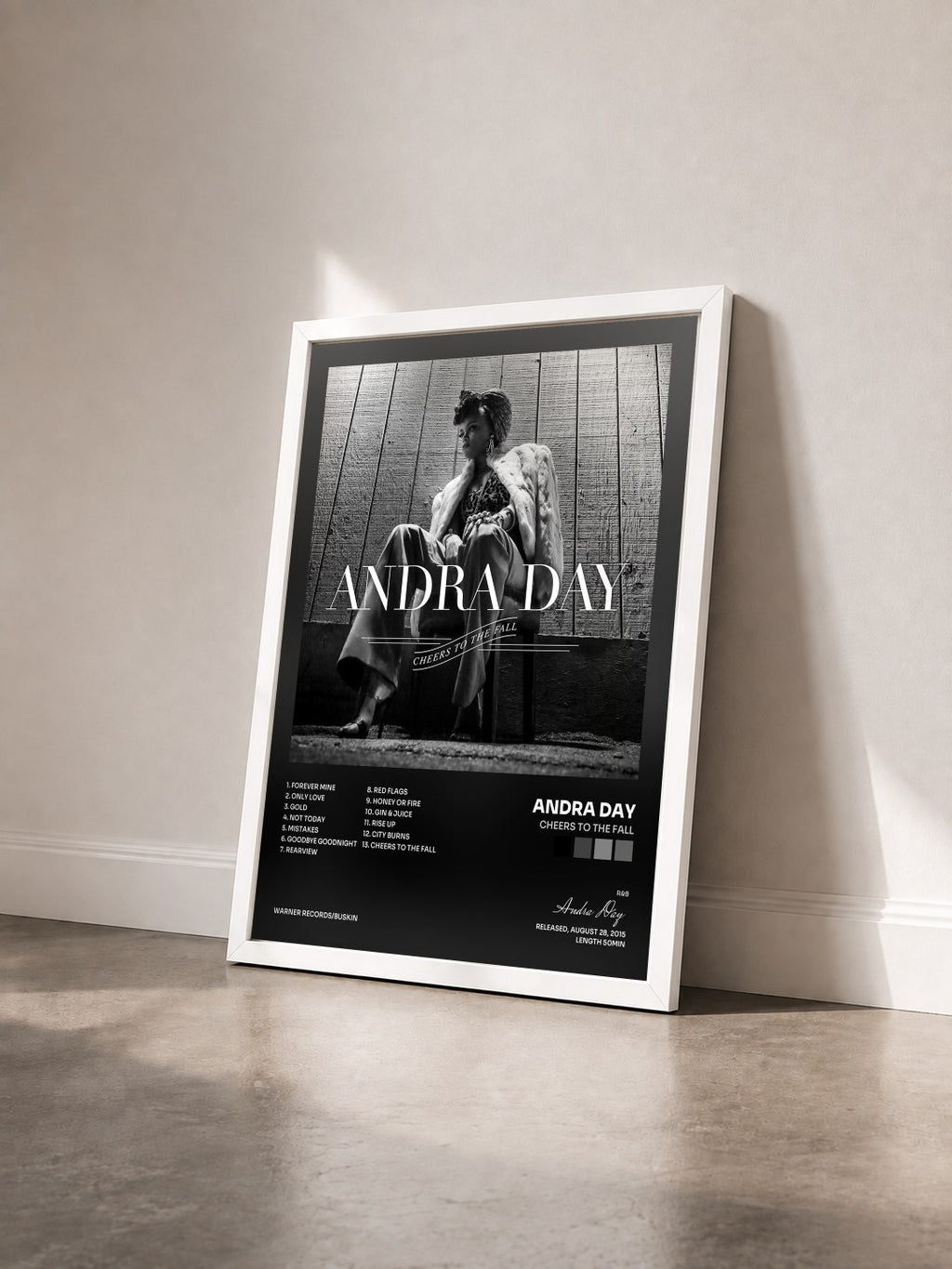 #blanc Tableau de l'album Cheers to the Fall de Andra Day vu de trois quarts, cadre blanc