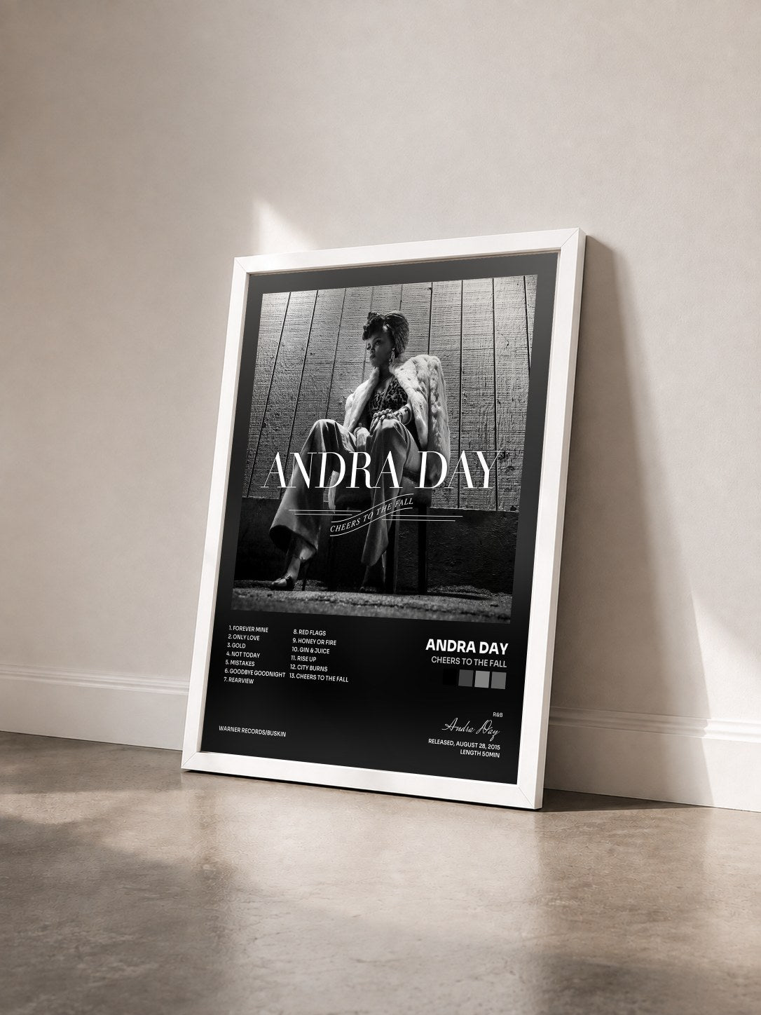 #blanc Tableau de l'album Cheers to the Fall de Andra Day vu de trois quarts, cadre blanc