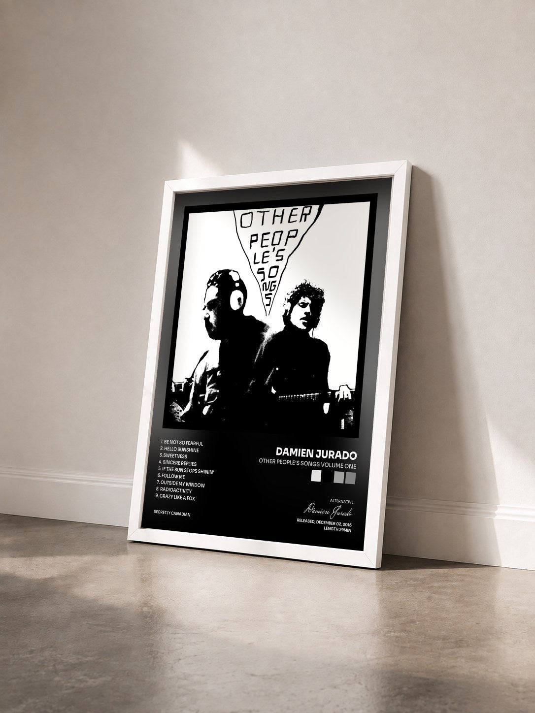#blanc Tableau de l'album Other People's Songs Volume One de Damien Jurado vu de trois quarts, cadre blanc