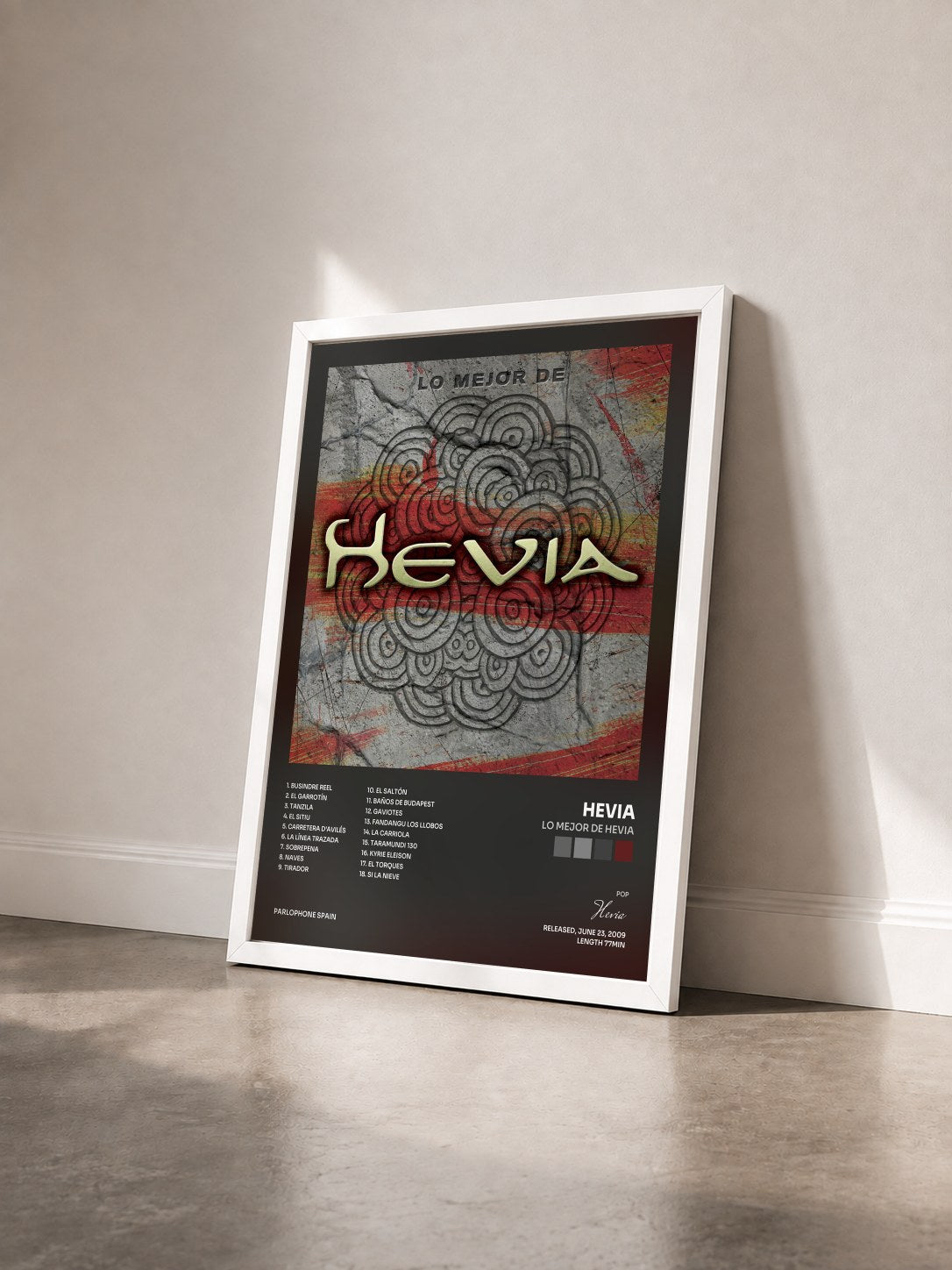 #blanc Tableau de l'album Lo Mejor De Hevia de Hevia vu de trois quarts, cadre blanc