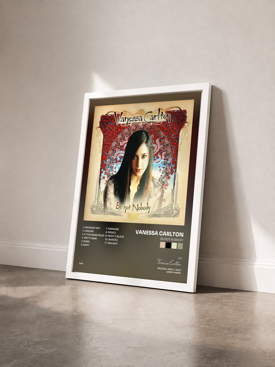 #blanc Tableau de l'album Be Not Nobody de Vanessa Carlton vu de trois quarts, cadre blanc