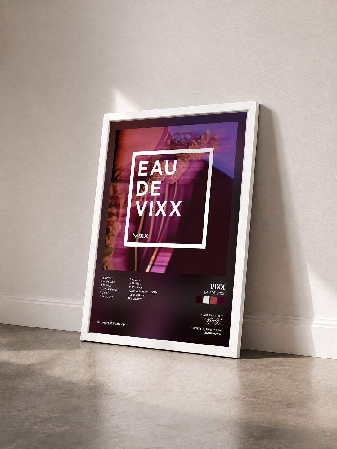 #blanc Tableau de l'album EAU DE VIXX de VIXX vu de trois quarts, cadre blanc