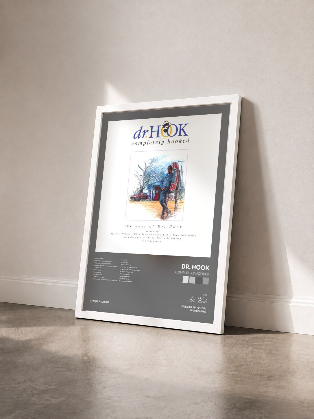 #blanc Tableau de l'album Completely Hooked de Dr. Hook vu de trois quarts, cadre blanc
