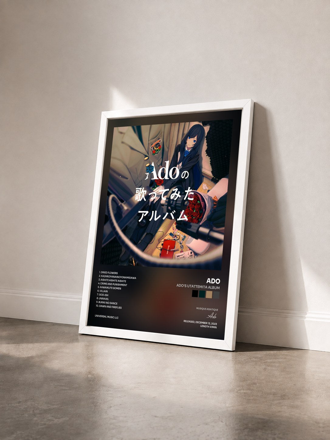 #blanc Tableau de l'album Ado's Utattemita Album de Ado vu de trois quarts, cadre blanc