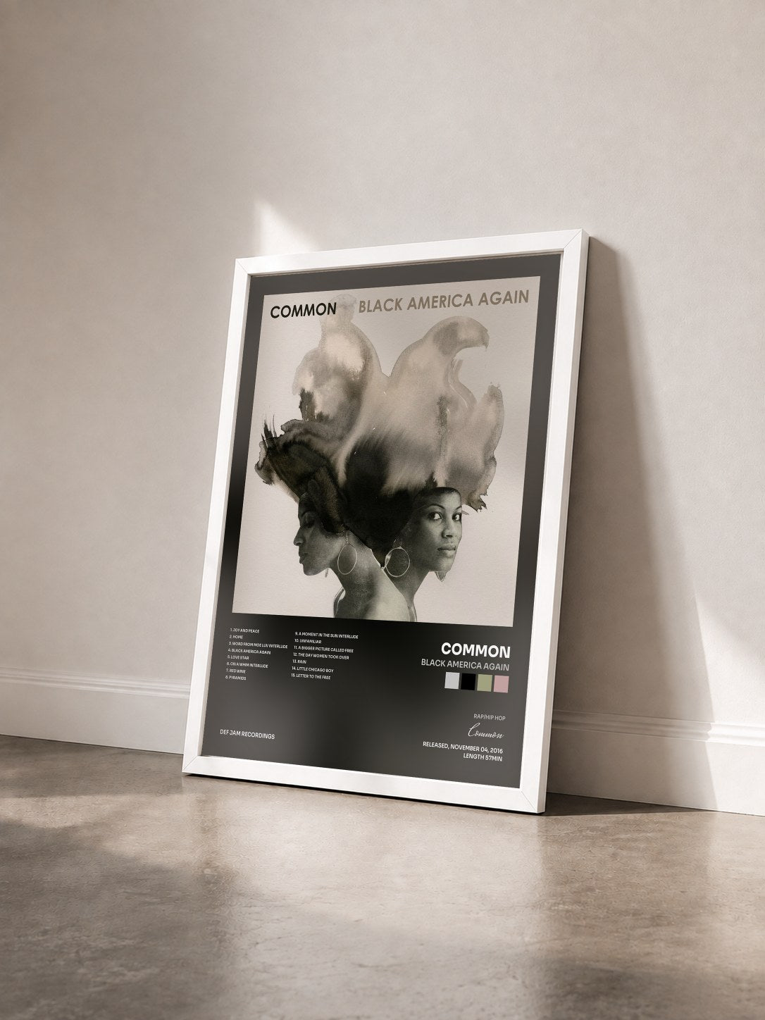 #blanc Tableau de l'album Black America Again de Common vu de trois quarts, cadre blanc