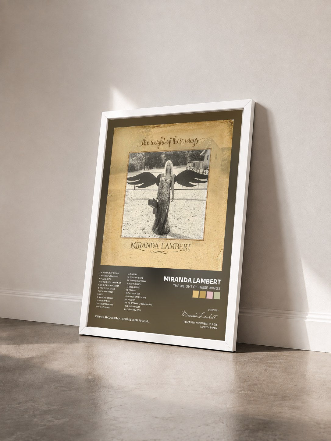 #blanc Tableau de l'album The Weight of These Wings de Miranda Lambert vu de trois quarts, cadre blanc
